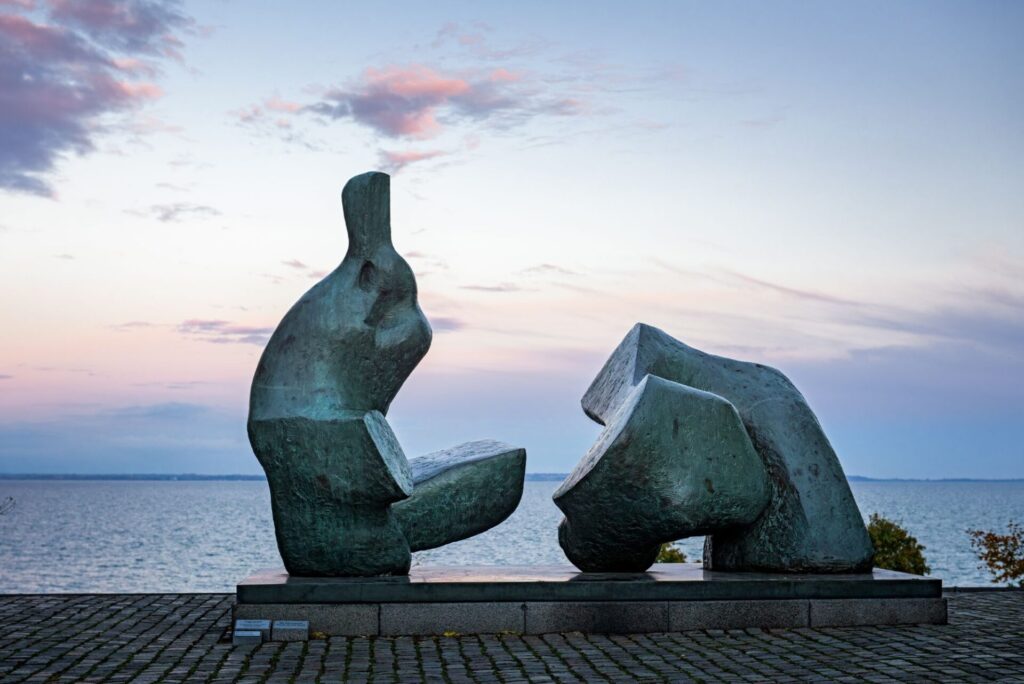 sculptures in front of the sea