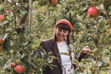 girl picking apples