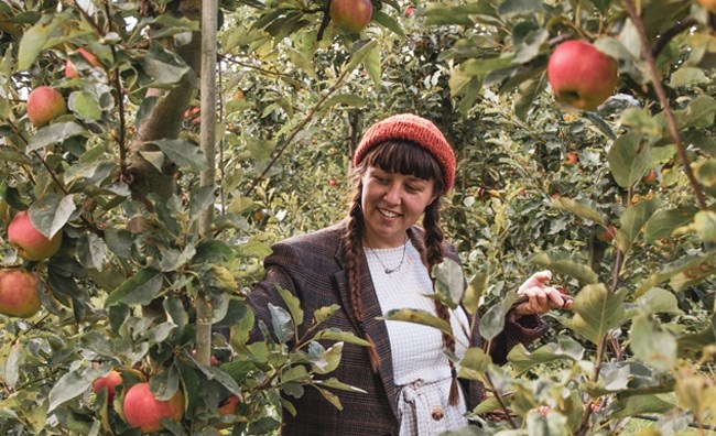 girl picking apples
