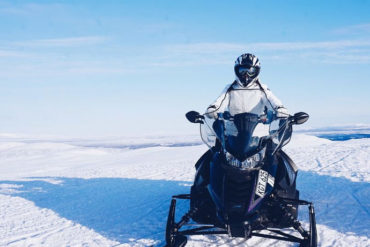 Guided snowmobile tour in Swedish Lapland