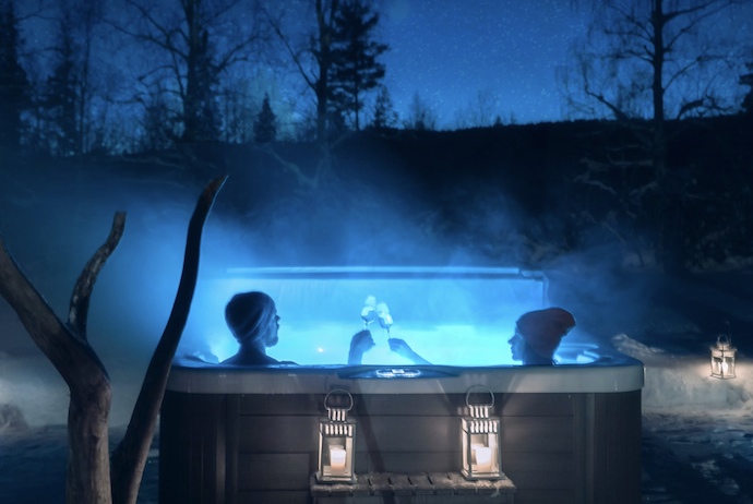 Nothing beats an outdoor hot hut at night at an Arctic spa