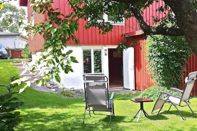 You can rent this Gothenburg flat which occupies a traditional red-painted house