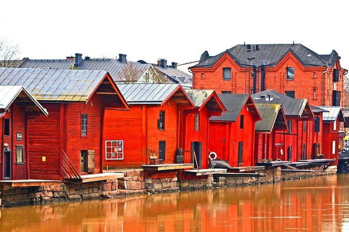 Porvoo, Finland has a pretty riverfront lined with red wooden houses