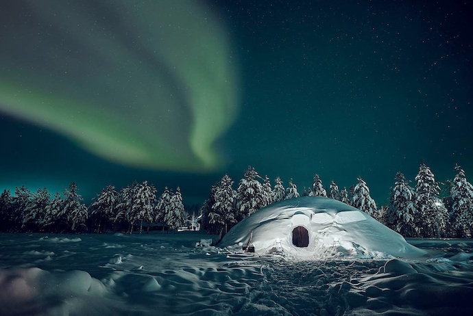 Keep warm in this snow-built igloo in FInland