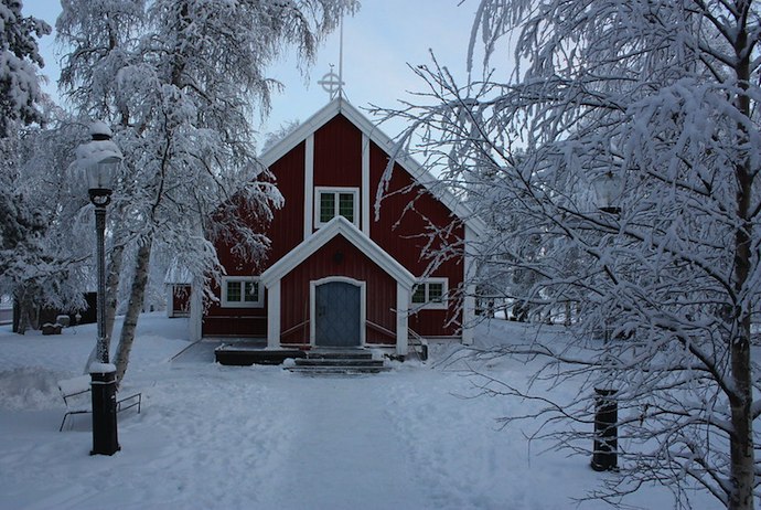 Go on a torch-lit procession through the snow to this Christmas carol concert in the Arctic Circle