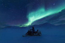 Northern Lights Hunt by Electric Snowmobile in Longyearbyen