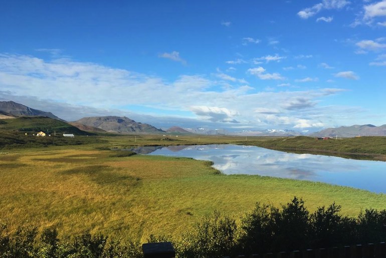 Remote cabin in Iceland with lake and mountain views