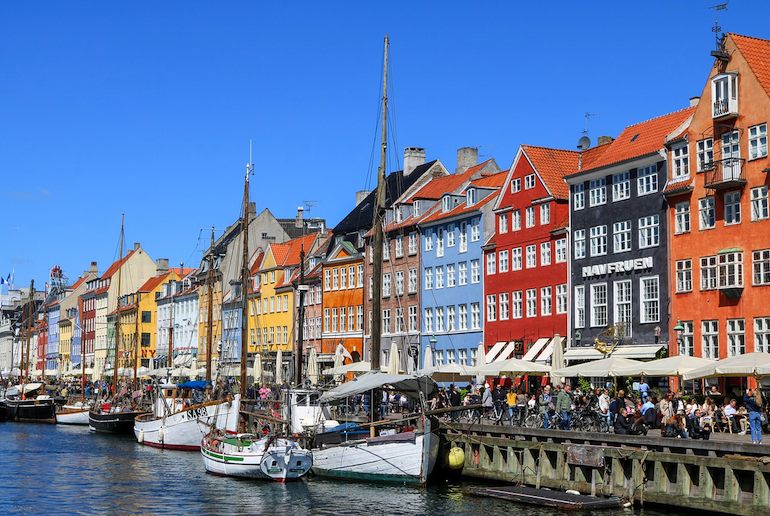 Lunch outdoors on Nyhavn is a great thing to do in summer in Denmark