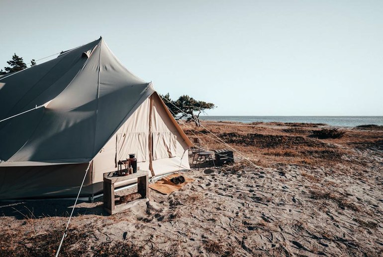 Go glamping on the beach in these safari tents in Sweden