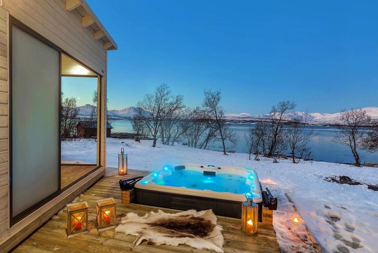 Warm up in a hot tub on an autumn evening in Norway