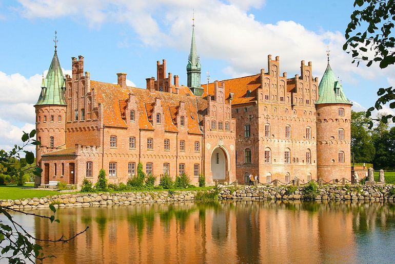 The historic Egeskov Castle is a great place for kids to visit in Denmark