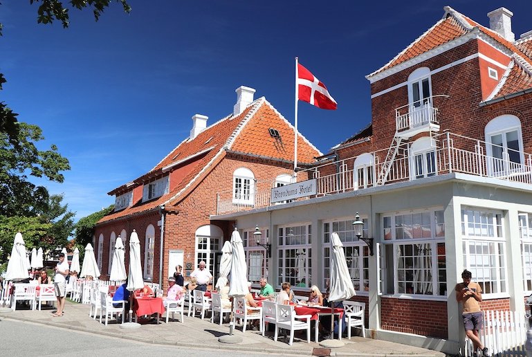 Few places reach the hygge levels of Skagen, with its yellow houses and red-tiled roofs, and cosy summerhouses in the dunes.