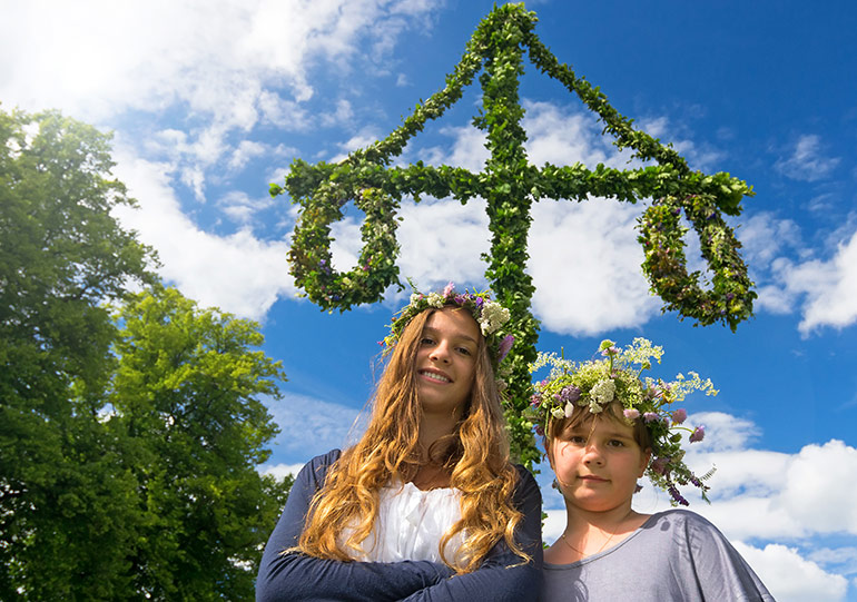 Swedish girls at Midsummer celebrations in Sweden