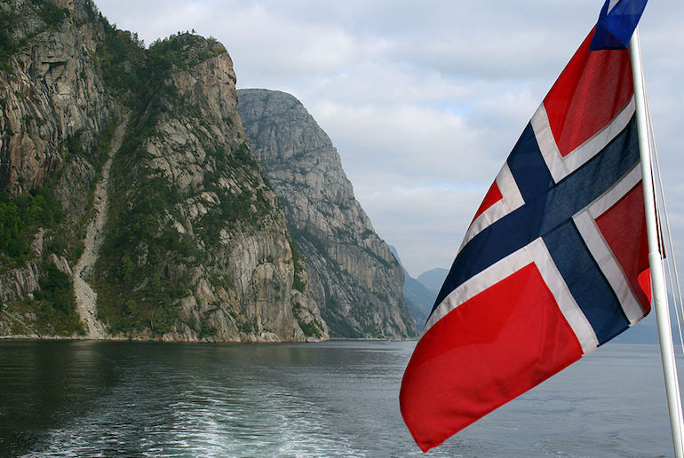 Norway's flag is red, white and blue and has the same Nordic Cross as many of the other flags of scandinavia