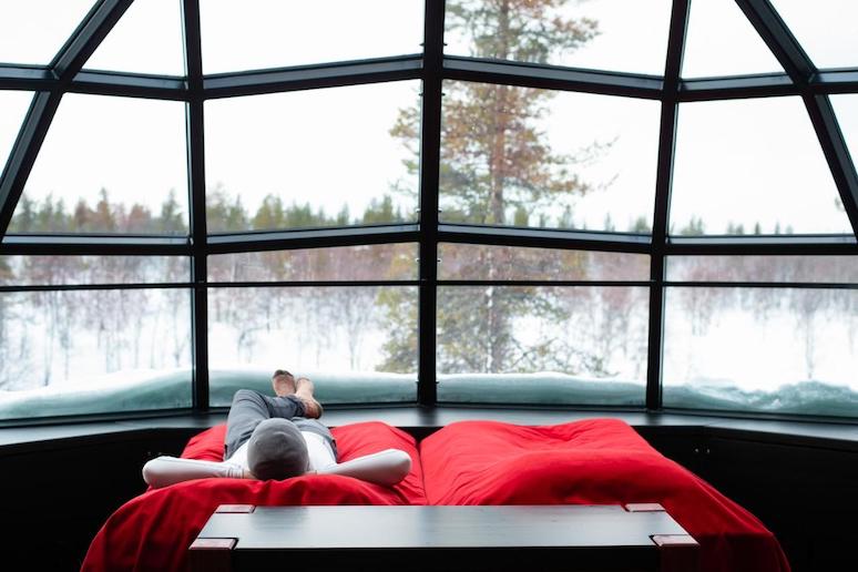 Check out the Kakslauttanen Arctic Resort in Finland for glass-roofed igloos
