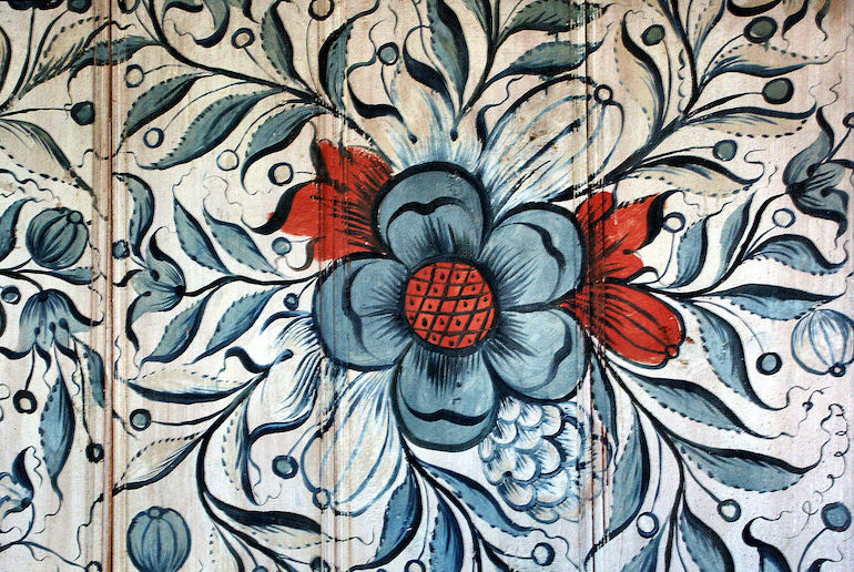 Norwegian rosemarling is traditional painting or carving on wood.