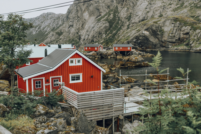 Stay in a rorbu, a wooden fishing hut, in Norway's Lofoten islands.