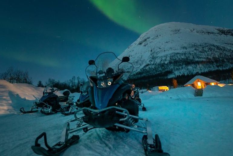 See the northern lights by snowmobile from Tromsø