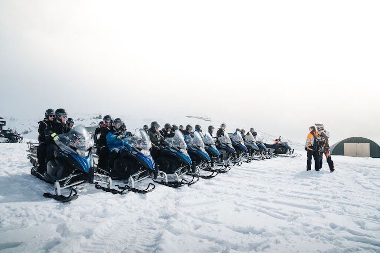 Combine a snowmobile tour with a trip to a thermal pool