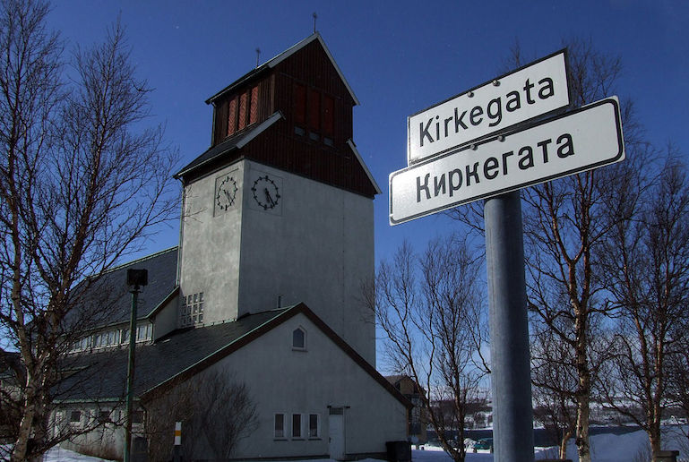 Kirkenes church with signs in Norwegian and Russian