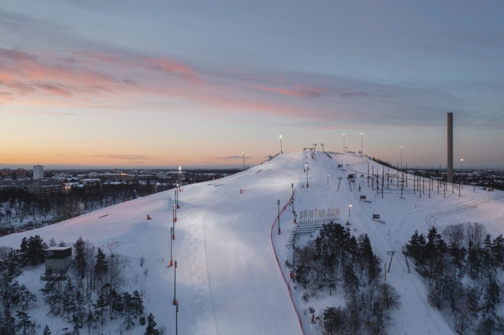 a ski slope at sunset