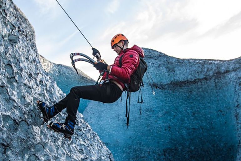 Go ice climbing in a blue cave in Iceland