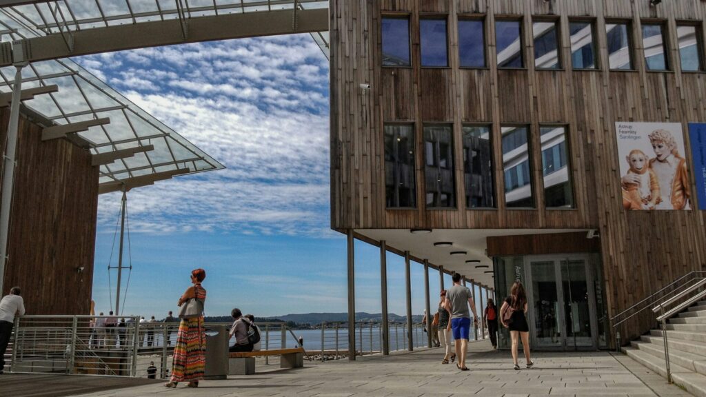 modern museum with people and blue sky