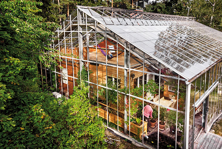 The Swedish naturhus is a kind of house within a greenhouse