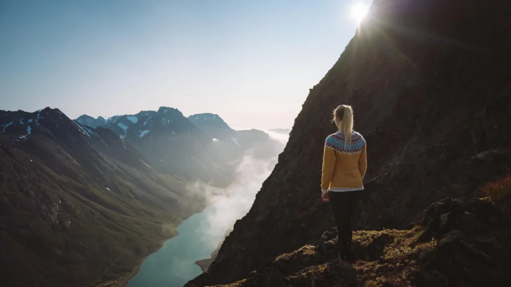 woman looking at fjord view