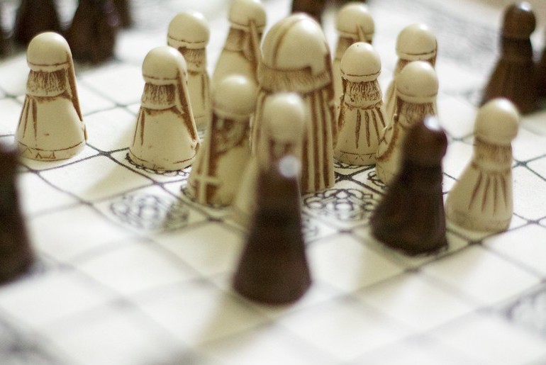In Viking Chess, the king piece is located in the centre of the board, and the other pieces are placed around it.
