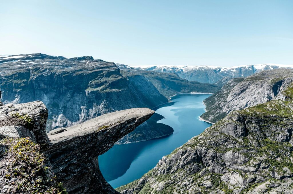 fjord with blue water and rugged mountains