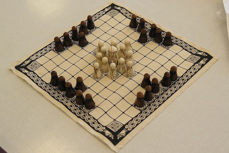 Viking Chess is played between two players: one playing the defenders, and the other playing the attackers. 
