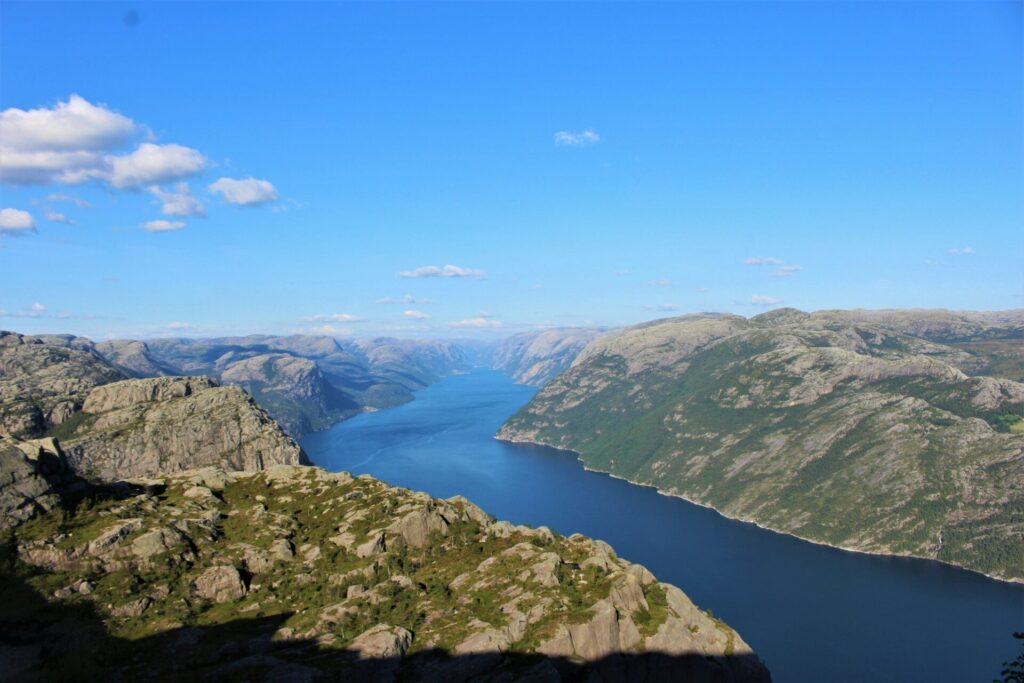 fjord seen from the sky with blue sky