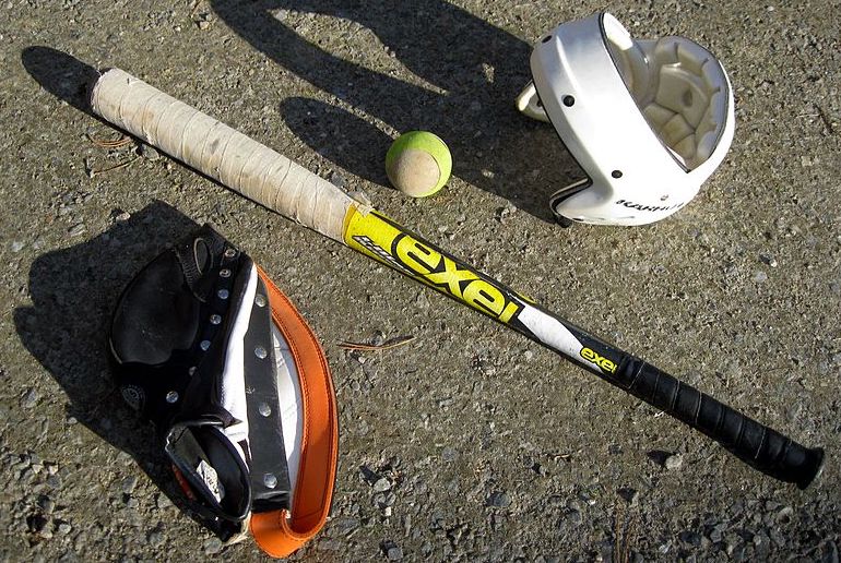 To play Finnish Pesäpallo, you need a bat, a ball and protective gear