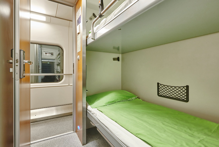 You can book a comfortable cabin on the sleeper train from Helsinki to Rovaniemi