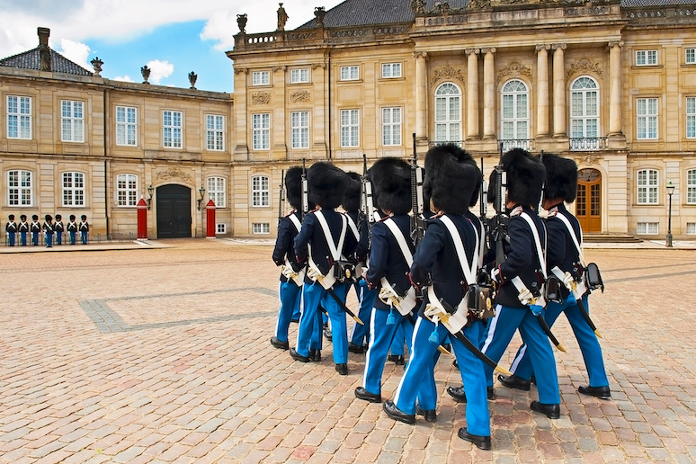 The changing of the guard takes places at Copenhagen's Amalienborg Palace.