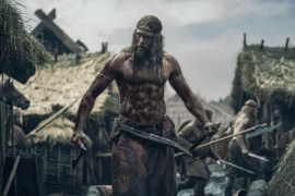 viking covered in blood with long hair