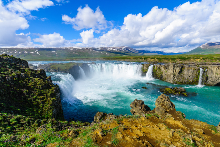 Goðafoss is a beautiful u-shaped semi-circular waterfall in Iceland