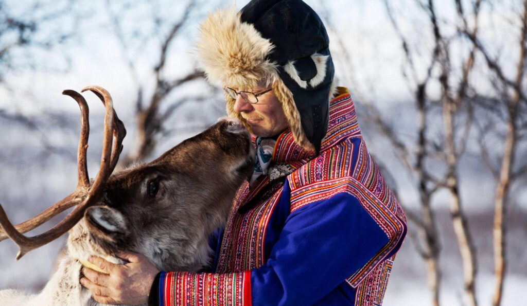 man and reindeer