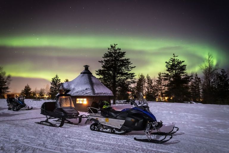 You can see the northern lights on a snowmobile tour from Levi in Finland