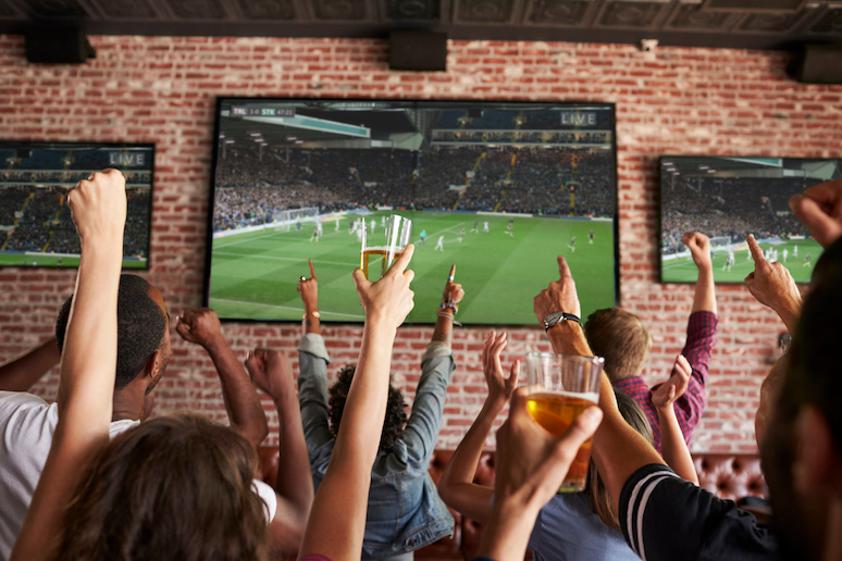 Watching a game in a sports bar in Stockholm is a great way to meet people.