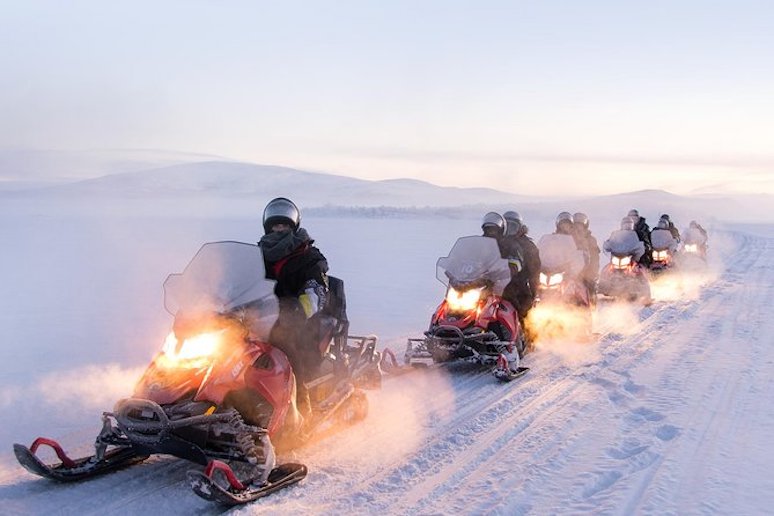 Visit the borders of Norway, Sweden and Finland on a snowmobile.
