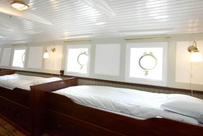 Sleep in a bunk on-board the Af Chapman in Stockholm