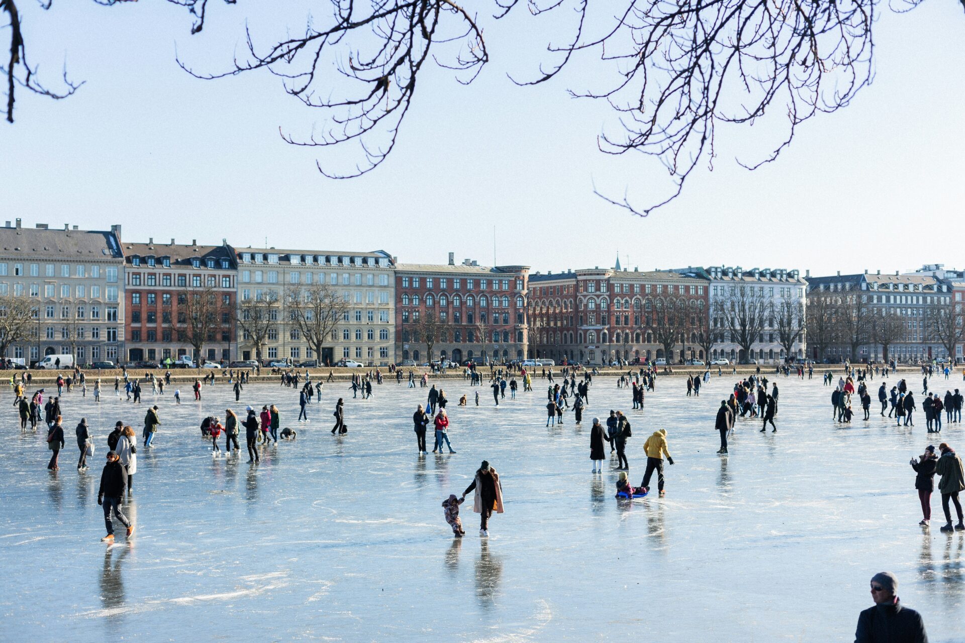 people ice skating on the sea in Copenhagen during winter