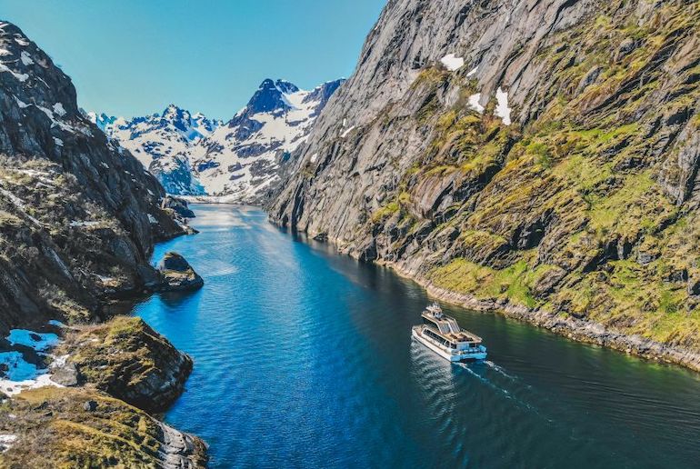 Take a silent boat trip on the Trollfjord from the Lofoten islands in Norway