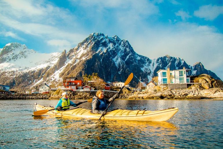 Kayak round the Lofoten islands in winter.