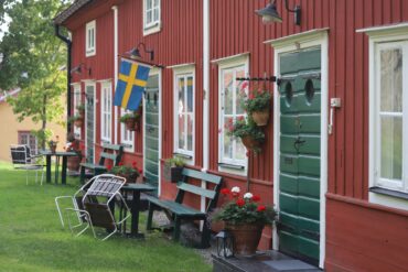red cabin with swedish flag
