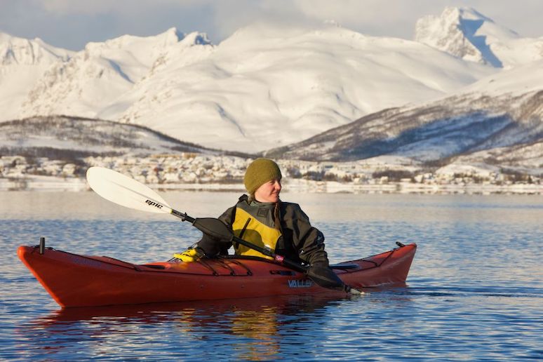 Go on a kayak trip in the waters round Tromso
