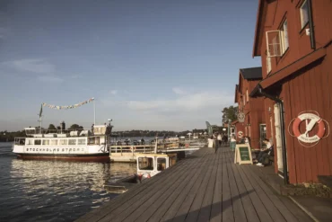 A passenger boat at the quay at the islands of Fjäderholmarna in the Stockholm archipelago.