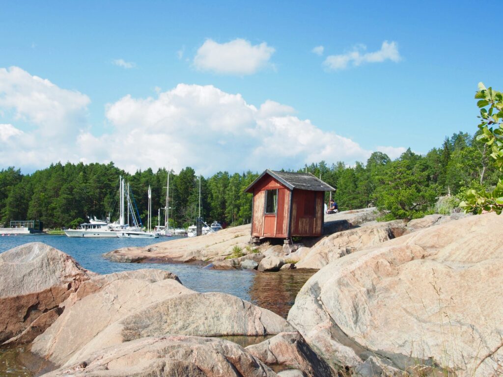 rocky beach with boats